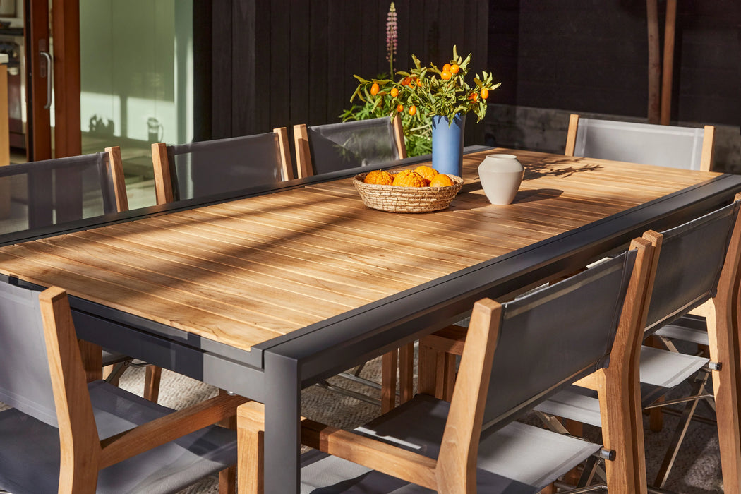 Teak + Aluminum Outdoor Expandable Dining Table + 8 595 Armless Chairs